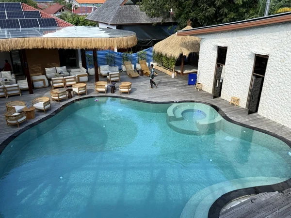 Zima Spa & Wellness — the main pool and its round plunge from the deck