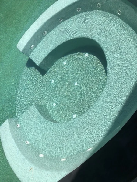 Zima Spa & Wellness — the jacuzzi seat in Irish Green, filled