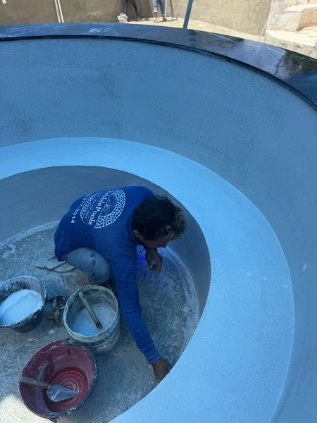 Zima Spa & Wellness — laying the blue finish in the cold plunge